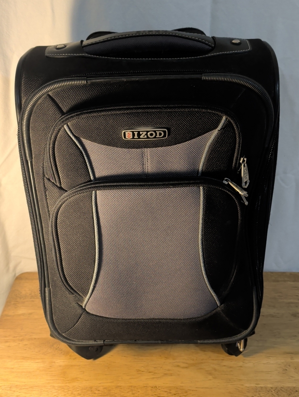 Izod Black and Gray Upright Carry-On Spinner. 20"